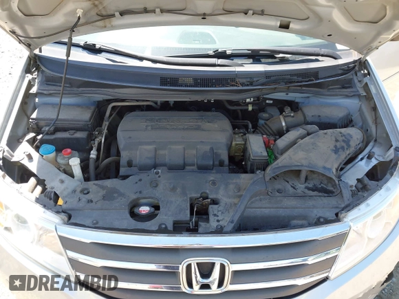 2012 Honda Odyssey Touring with VIN 5FNRL5H96CB043939, listed as a IAAI auction lot 41983643 with 202,535 mi miles. Bid and sale history available at carsss.com. Image 10.