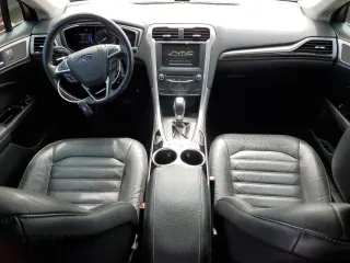 2013 Ford Fusion SE Hybrid with VIN 3FA6P0LU1DR246703, listed as a Copart auction lot 58862165 with 147,543 mi miles and Clean title. Bid and sale history available at DreamBid. Image 8.