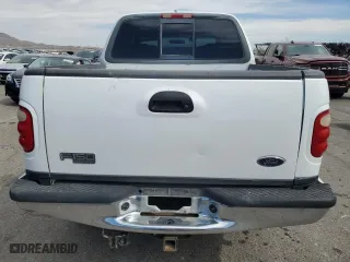2001 Ford F-150 SuperCrew XLT with VIN 1FTRW08L51KB76553, listed as a Copart auction lot 75202514 with 324,064 mi miles and Salvage Title. Bid and sale history available at carsss.com. Image 6.