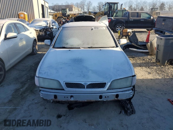 2002 Infiniti G20 Luxury with VIN JNKCP11A02T512055, listed as a Copart auction lot 42599045 with 160,649 mi miles and Salvage Title. Bid and sale history available at DreamBid. Image 5.