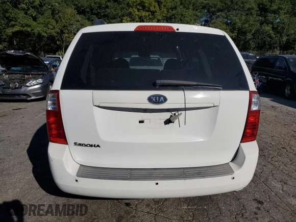 2010 Kia Sedona LX with VIN KNDMG4C35A6342603, listed as a Copart auction lot 76659124 with 205,052 mi miles and Clean Title. Bid and sale history available at carsss.com. Image 6.