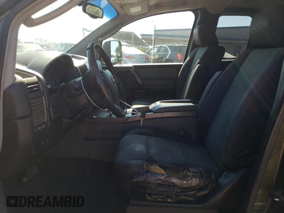 2005 Nissan Titan SE z VIN 1N6AA06B85N507424, wystawiony jako Copart lot #64841425 z przebiegiem 208 542 mil mil oraz Czysty tytuł • Clean title. Historia ofert i sprzedaży dostępna na DreamBid. Obrazek 7.
