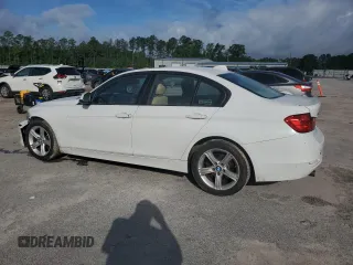 2014 BMW 3 Series 320i xDrive with VIN WBA3C3G52ENS67719, listed as a Copart auction lot 56863505 with 90,490 mi miles and Salvage title. Bid and sale history available at DreamBid. Image 2.