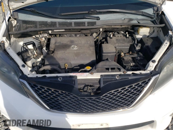 2014 Toyota Sienna SE with VIN 5TDXK3DCXES498422, listed as a Copart auction lot 51060775 with 131,541 mi miles and Clean Title. Bid and sale history available at DreamBid. Image 12.