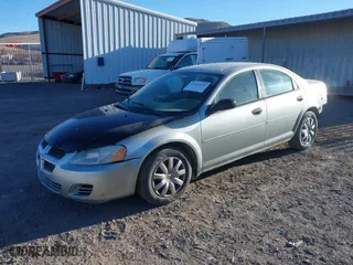2004 Dodge Stratus SE with VIN 1B3EL36X24N267301, listed as a IAAI auction lot 41402238 with 143,579 mi miles. Bid and sale history available at carsss.com. Image 2.