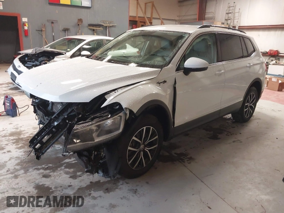 2020 Volkswagen Tiguan SE with VIN 3VV3B7AX4LM141023, listed as a IAAI auction lot 41521923 with 69,479 mi miles and . Bid and sale history available at DreamBid. Image 18.