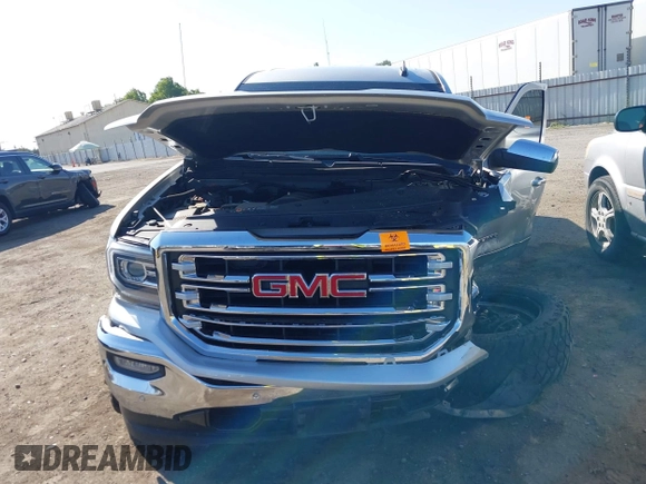 2018 GMC Sierra 1500 SLT with VIN 3GTP1NEC2JG528387, listed as a IAAI auction lot 42598955 with Not provided miles and . Bid and sale history available at DreamBid. Image 12.
