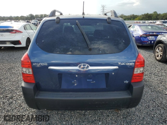 2005 Hyundai Tucson GLS with VIN KM8JN12D95U051374, listed as a Copart auction lot 73854704 with 0 mi miles and Salvage Title. Bid and sale history available at carsss.com. Image 6.