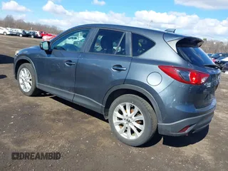 2013 Mazda CX-5 Grand Touring with VIN JM3KE4DE1D0164488, listed as a IAAI auction lot 41683326 with 129,989 mi miles. Bid and sale history available at carsss.com. Image 3.