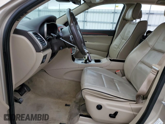 2015 Jeep Grand Cherokee High Altitude with VIN 1C4RJECG4FC669809, listed as a Copart auction lot 88909645 with 115,752 mi miles and Salvage Title. Bid and sale history available at carsss.com. Image 7.