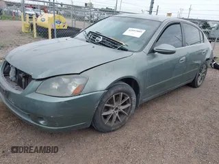 2006 Nissan Altima 2.5 with VIN 1N4AL11D46N325738, listed as a IAAI auction lot 42097809 with 299,243 mi miles. Bid and sale history available at carsss.com. Image 2.