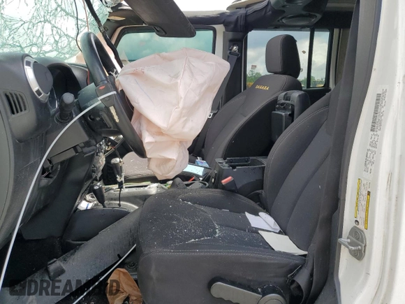 2013 Jeep Wrangler Unlimited Sahara with VIN 1C4HJWEG1DL516784, listed as a Copart auction lot 56382805 with 205,874 mi miles and Salvage title. Bid and sale history available at DreamBid. Image 7.