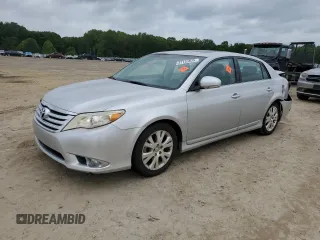 2012 Toyota Avalon z VIN 4T1BK3DBXCU454457, wystawiony jako Copart lot #57153835 z przebiegiem 128 064 mil mil oraz Szkoda całkowita • Salvage title. Historia ofert i sprzedaży dostępna na DreamBid. Obrazek 1.