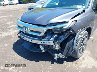 2021 Honda Pilot Touring 8-Passenger z VIN 5FNYF6H9XMB059037, wystawiony jako IAAI lot #42202410 z przebiegiem 49 267 mil mil oraz . Historia ofert i sprzedaży dostępna na DreamBid. Obrazek 6.