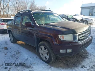 2009 Honda Ridgeline RTL with VIN 2HJYK16509H000803, listed as a IAAI auction lot 40993162 with 193,979 mi miles. Bid and sale history available at carsss.com. Image 1.
