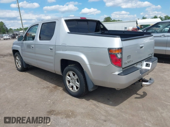 2006 Honda Ridgeline RTL with VIN 2HJYK16566H550339, listed as a IAAI auction lot 42223323 with 240,372 mi miles and . Bid and sale history available at DreamBid. Image 3.
