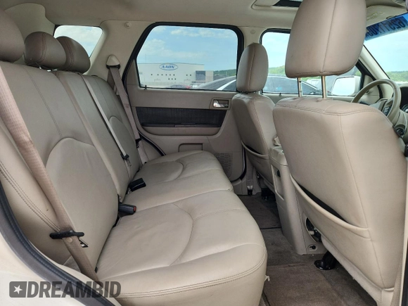 2009 Mercury Mariner Hybrid with VIN 4M2CU29369KJ14719, listed as a Copart auction lot 62511705 with 144,062 mi miles and Salvage title. Bid and sale history available at DreamBid. Image 11.