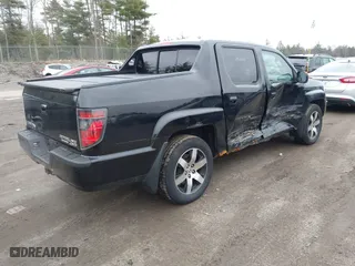 2014 Honda Ridgeline SE with VIN 5FPYK1F66EB005881, listed as a IAAI auction lot 41977349 with 184,567 mi miles. Bid and sale history available at carsss.com. Image 4.