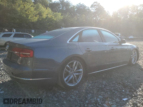 2015 Audi A8 with VIN WAUJGAFD3FN013026, listed as a Copart auction lot 67650374 with 88,064 mi miles and Salvage title. Bid and sale history available at DreamBid. Image 3.