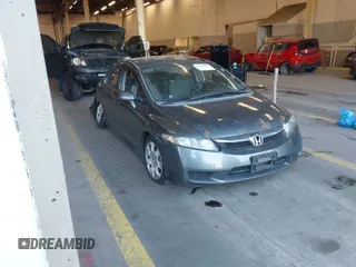 2009 Honda Civic LX z VIN 2HGFA16599H314871, wystawiony jako IAAI lot #41403199 z przebiegiem 144 963 mil mil oraz . Historia ofert i sprzedaży dostępna na DreamBid. Obrazek 1.