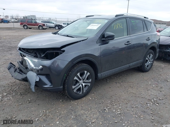 2016 Toyota RAV4 LE with VIN JTMBFREVXGJ091427, listed as a IAAI auction lot 42010142 with 165,548 mi miles. Bid and sale history available at carsss.com. Image 18.