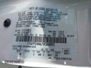 2007 Ford Focus S with VIN 1FAFP34N67W360092, listed as a IAAI auction lot 42194821 with 64,278 mi miles and . Bid and sale history available at carsss.com. Image 9.