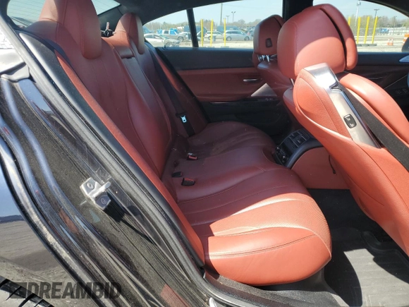 2014 BMW 6 Series 650i xDrive z VIN WBA6B4C5XED099250, wystawiony jako Copart lot #52734845 z przebiegiem Nie podano mil oraz Czysty tytuł • Clean title. Historia ofert i sprzedaży dostępna na DreamBid. Obrazek 10.