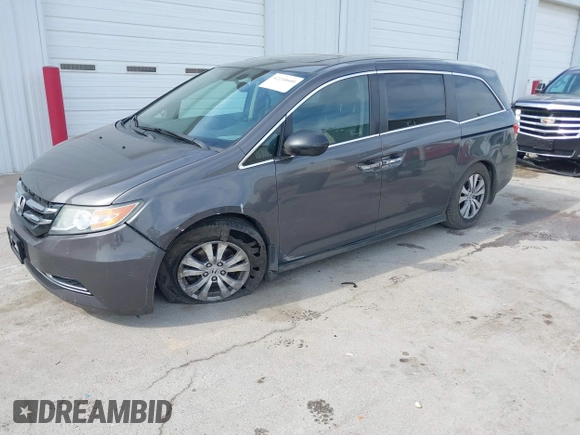 2014 Honda Odyssey EX-L with VIN 5FNRL5H67EB106183, listed as a IAAI auction lot 42210600 with 196,166 mi miles and . Bid and sale history available at DreamBid. Image 17.