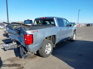 2015 Chevrolet Silverado 1500 LT with VIN 3GCUKREC5FG308790, listed as a IAAI auction lot 41879712 with 85,015 mi miles. Bid and sale history available at carsss.com. Image 4.