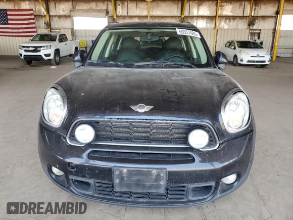 2011 MINI Countryman S with VIN WMWZC5C54BWM10218, listed as a Copart auction lot 60557685 with 192,422 mi miles and Salvage title. Bid and sale history available at DreamBid. Image 5.