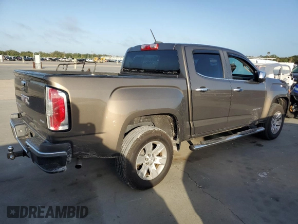 2017 GMC Canyon 2WD SLE with VIN 1GTG5CEA9H1176098, listed as a Copart auction lot 76577424 with 89,220 mi miles and Salvage Title. Bid and sale history available at carsss.com. Image 3.