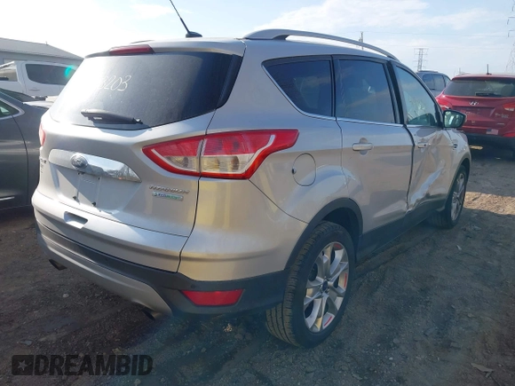 2015 Ford Escape Titanium z VIN 1FMCU0J91FUC41531, wystawiony jako IAAI lot #41903203 z przebiegiem 118 962 mil mil oraz . Historia ofert i sprzedaży dostępna na DreamBid. Obrazek 4.