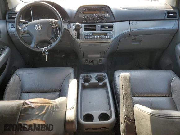 2007 Honda Odyssey EX-L z VIN 5FNRL38697B039741, wystawiony jako Copart lot #56868365 z przebiegiem 135 742 mil mil oraz Czysty tytuł • Clean title. Historia ofert i sprzedaży dostępna na DreamBid. Obrazek 8.