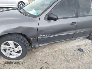 2002 Pontiac Sunfire SE z VIN 1G2JB524427245927, wystawiony jako IAAI lot #42346448 z przebiegiem 179 412 mil mil oraz . Historia ofert i sprzedaży dostępna na DreamBid. Obrazek 6.