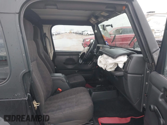 2004 Jeep Wrangler X with VIN 1J4FA39S34P753865, listed as a IAAI auction lot 41948545 with 198,169 mi miles. Bid and sale history available at carsss.com. Image 5.