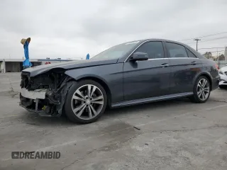 2014 Mercedes-Benz E 350 Sport with VIN WDDHF5KB4EB019973, listed as a Copart auction lot 57497525 with 107,218 mi miles and Salvage title. Bid and sale history available at DreamBid. Image 1.
