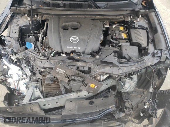 2020 Mazda CX-5 Grand Touring with VIN JM3KFADM4L1783968, listed as a Copart auction lot 85994244 with 89,074 mi miles and Salvage Title. Bid and sale history available at DreamBid. Image 12.