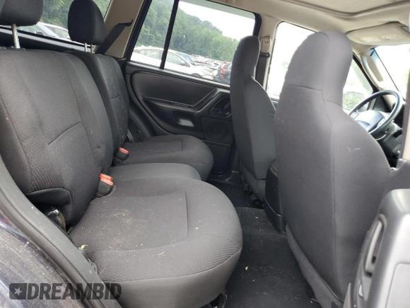 2004 Jeep Grand Cherokee Laredo with VIN 1J4GW48S64C160831, listed as a Copart auction lot 61920005 with 135,243 mi miles and Clean title. Bid and sale history available at DreamBid. Image 11.