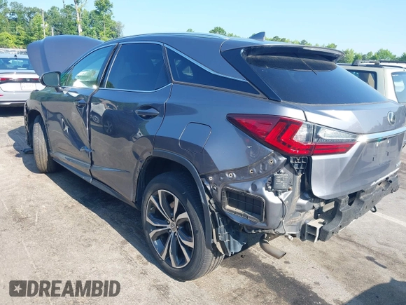 2017 Lexus RX 350 with VIN 2T2BZMCA4HC074707, listed as a IAAI auction lot 42439938 with 127,240 mi miles and . Bid and sale history available at DreamBid. Image 3.