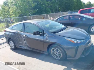 2022 Toyota Prius L Eco z VIN JTDKAMFU5N3188480, wystawiony jako IAAI lot #42146176 z przebiegiem 35 554 mil mil oraz . Historia ofert i sprzedaży dostępna na DreamBid. Obrazek 14.