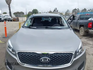 2016 Kia Sorento LX with VIN 5XYPG4A35GG149678, listed as a IAAI auction lot 41478731 with 128,895 mi miles. Bid and sale history available at carsss.com. Image 6.