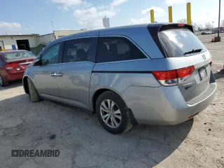 2016 Honda Odyssey EX-L with VIN 5FNRL5H67GB026899, listed as a Copart auction lot 51612295 with 74,010 mi miles and Salvage Title. Bid and sale history available at DreamBid. Image 2.