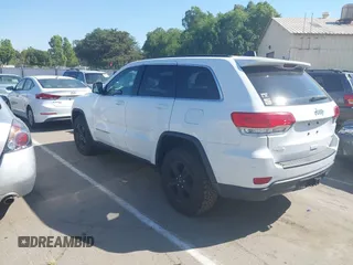 2014 Jeep Grand Cherokee Laredo with VIN 1C4RJFAG9EC334021, listed as a IAAI auction lot 42128823 with 161,741 mi miles. Bid and sale history available at carsss.com. Image 3.