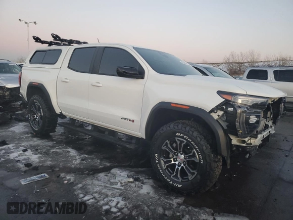 2023 GMC Canyon 4WD AT4 with VIN 1GTP6DEK4P1180070, listed as a Copart auction lot 42376095 with 26,892 mi miles and Salvage Title. Bid and sale history available at carsss.com. Image 4.