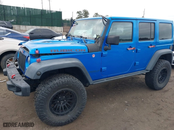 2016 Jeep Wrangler Unlimited Rubicon with VIN 1C4BJWFG2GL192074, listed as a IAAI auction lot 41598861 with 70,000 mi miles. Bid and sale history available at carsss.com. Image 2.