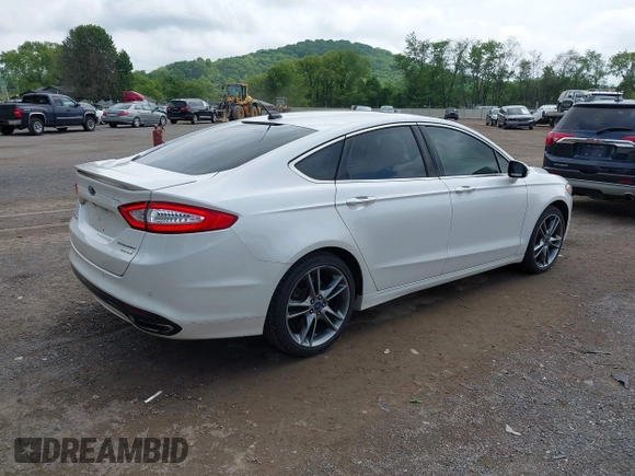 2014 Ford Fusion Titanium с VIN 3FA6P0K97ER352345, выставлен на аукционе IAAI как лот 42370970 с пробегом 182 895 миль миль и . История ставок и продаж доступна на DreamBid. Изображение 4.