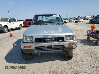1990 Toyota Pickup DLX z VIN JT4VN13D3L5024456, wystawiony jako Copart lot #75834064 z przebiegiem 200 893 mil mil oraz Szkoda całkowita • Salvage title. Historia ofert i sprzedaży dostępna na DreamBid. Obrazek 5.