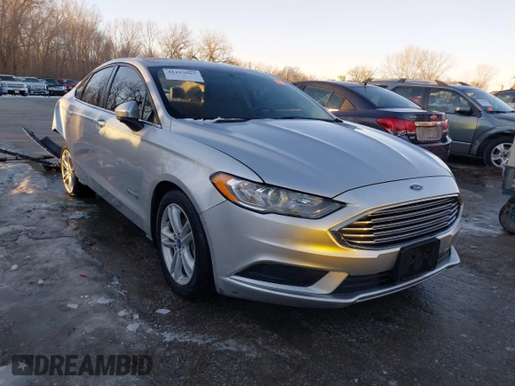 2018 Ford Fusion SE z VIN 3FA6P0LU4JR269064, wystawiony jako IAAI lot #41222967 z przebiegiem 115 077 mil mil oraz . Historia ofert i sprzedaży dostępna na DreamBid. Obrazek 1.
