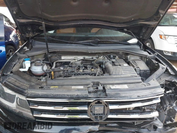 2018 Volkswagen Tiguan SEL z VIN 3VV3B7AX1JM036551, wystawiony jako IAAI lot #42170151 z przebiegiem 97 506 mil mil oraz . Historia ofert i sprzedaży dostępna na DreamBid. Obrazek 10.
