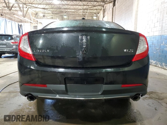 2014 Lincoln MKS z VIN 1LNHL9DK7EG610823, wystawiony jako Copart lot #47544585 z przebiegiem 131 176 mil mil oraz Czysty tytuł • Clean title. Historia ofert i sprzedaży dostępna na DreamBid. Obrazek 6.